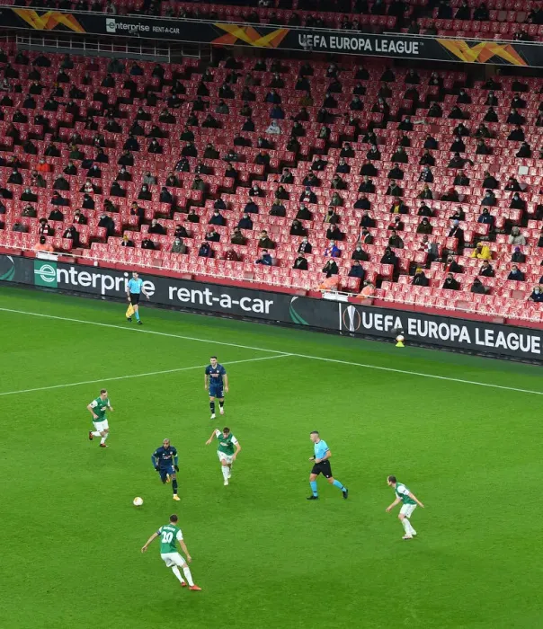 Framed Print : Arsenal's Emirates Stadium: A Ghostly Arena in UEFA Europa League Match Against Rapid Wien Amidst Pandemic Restrictions
