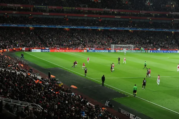 Framed Print : Arsenal's Emirates Stadium Ablaze with Champions League Tension: Arsenal FC vs AC Milan