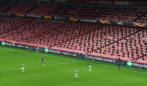 Arsenal's Emirates Stadium: A Ghostly Europa League Showdown Against Rapid Wien (December 2020)