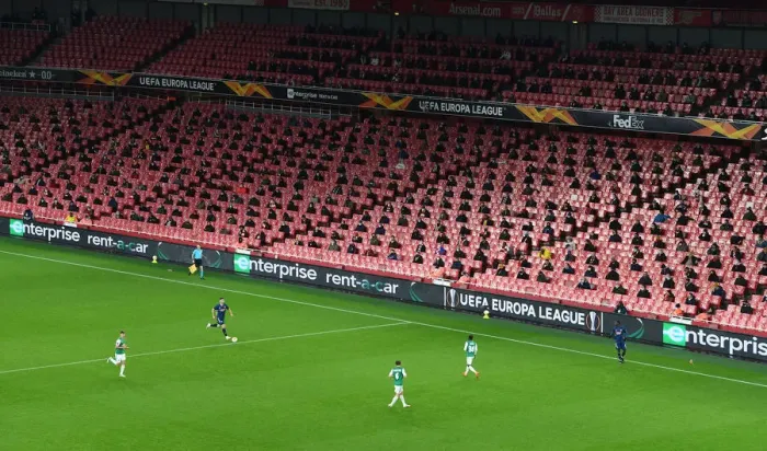 Framed Print : Arsenal's Emirates Stadium: A Ghostly Europa League Showdown Against Rapid Wien (December 2020)