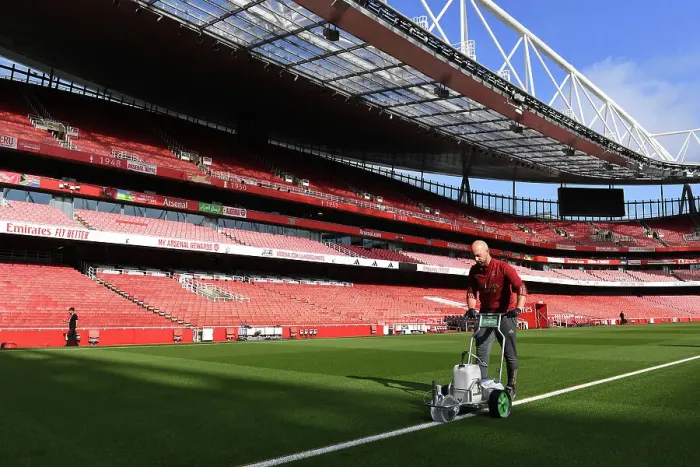 Framed Print : Arsenal's Emirates Stadium: Grounds Crew Prepare for Arsenal v Fulham Premier League Clash (2023-24)