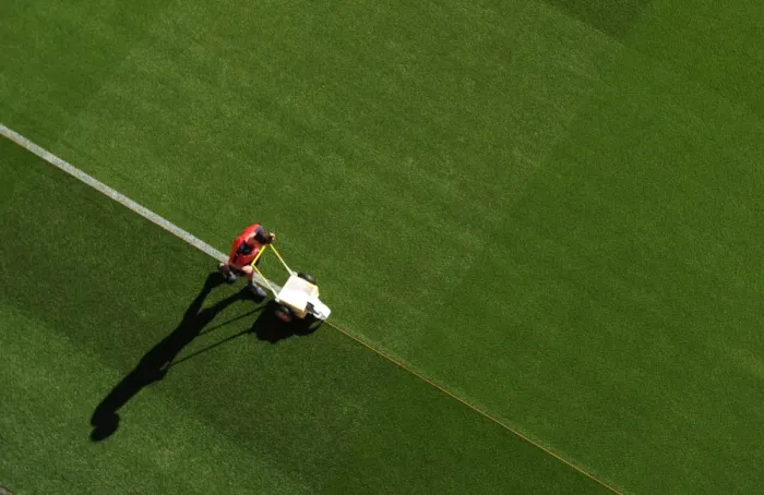 Framed Print : Arsenal's Emirates Stadium: Pre-Match Pitch Preparation for Arsenal vs. West Ham United, 2015-16