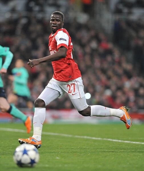 Arsenal's Emmanuel Eboue Celebrates Goal Against Barcelona in UEFA Champions League