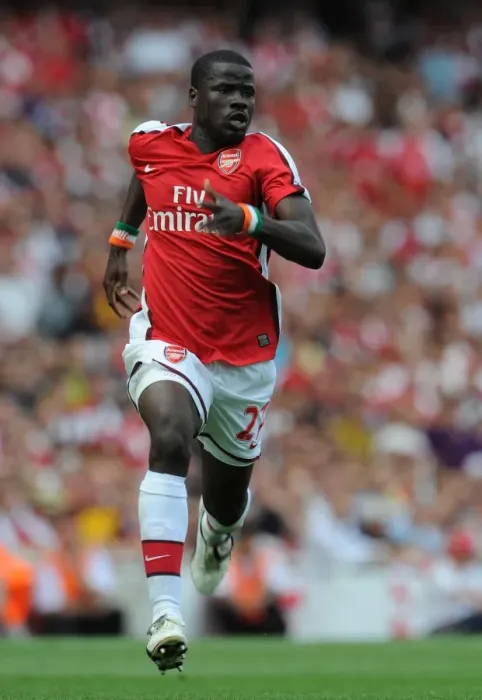 Framed Print : Arsenal's Emmanuel Eboue Celebrates Goal Against Portsmouth in 2009 Framed Print : Arsenal's Emmanuel Eboue Celebrates Goal Against Portsmouth in 2009