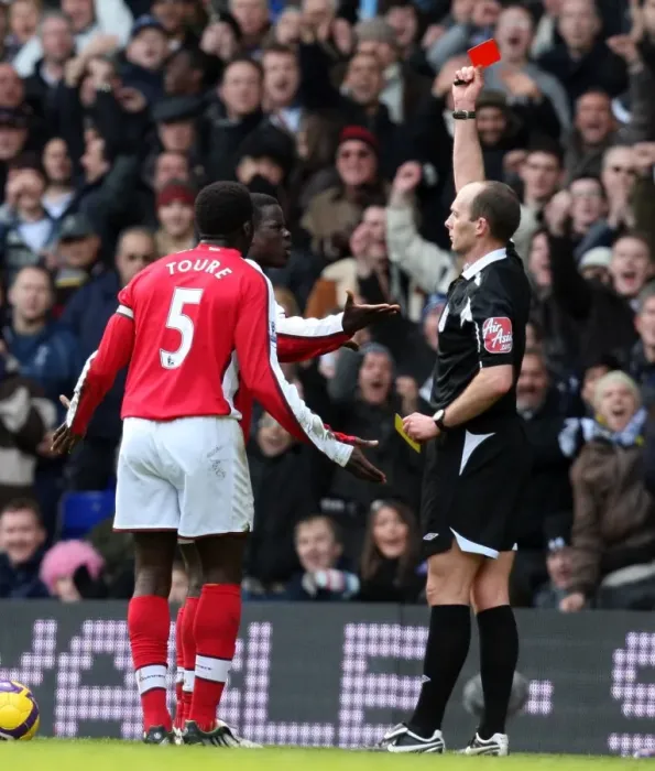 Framed Print : Arsenal's Emmanuel Eboue Receives Red Card from Referee Mike Dean in Barclays Premier League Match against Tottenham Hotspur