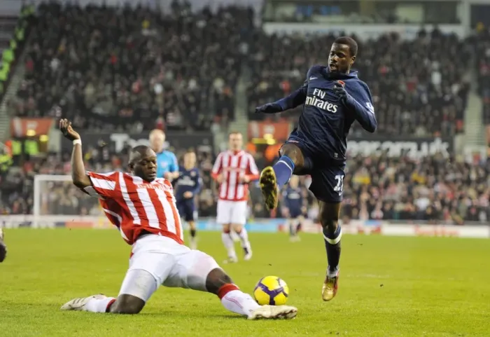 Framed Print : Arsenal's Emmanuel Eboue Shines in 3-1 Victory Over Stoke City