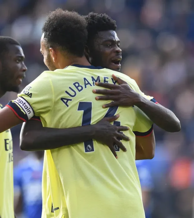 Framed Print : Arsenal's Emotional Reunion: Thomas Partey and Pierre-Emerick Aubameyang Hug it Out After Leicester City Victory