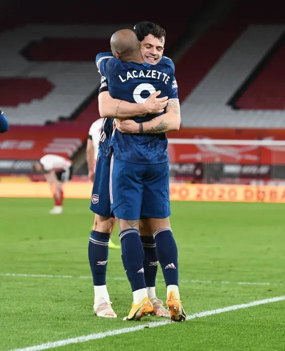 Framed Print : Arsenal's Euphoric Double Act: Lacazette and Xhaka's Goal Celebration vs Sheffield United (2020-21) Framed Print : Arsenal's Euphoric Double Act: Lacazette and Xhaka's Goal Celebration vs Sheffield United (2020-21)