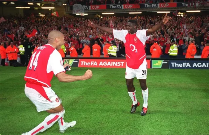 Framed Print : Arsenal's Euphoric FA Cup Victory: Kolo Toure's Memorable Backflip at Millennium Stadium, 2003