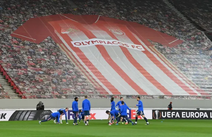 Framed Print : Arsenal's Empty Europa League Battle Against Olympiacos in Piraeus Framed Print : Arsenal's Empty Europa League Battle Against Olympiacos in Piraeus