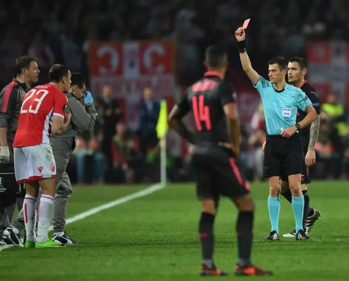 Framed Print : Arsenal's Europa League Clash with Crvena Zvezda: Hicham Zakrani Shows Red Card to Milan Rodic