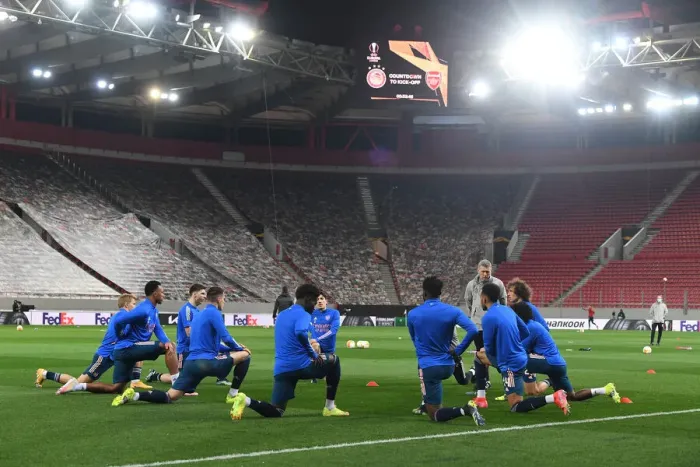 Framed Print : Arsenal's Empty Europa League Clash Against Olympiacos in Piraeus
