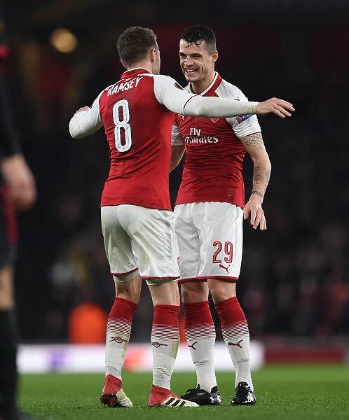 Arsenal's Europa League Double Strike: Xhaka and Ramsey's Goals Against AC Milan