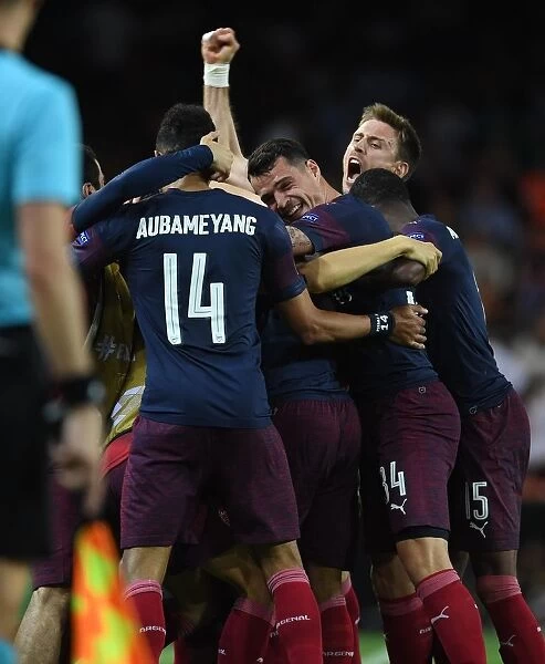 Arsenal's Europa League Double Victory: Aubameyang, Xhaka, and Monreal's Triumphant Celebration (2018-19)