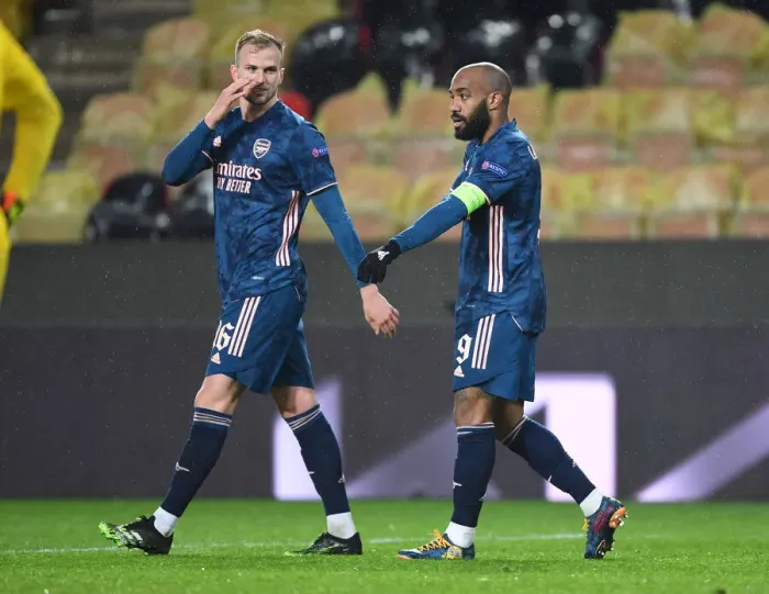 Framed Print : Arsenal's Europa League Triumph: Alexis Lacazette and Rob Holding's Empty Net Celebrations (April 2021)