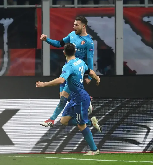 Framed Print : Arsenal's Europa League Victory: Ramsey and Kolasinac's Unforgettable Goal Celebration vs AC Milan