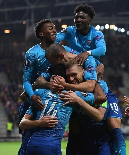 Arsenal's Europa League Victory: Rob Holding, Theo Walcott, Ainsley Maitland-Niles, Joe Willock, and Jack Wilshere Celebrate Goals Against FC BATE Borisov