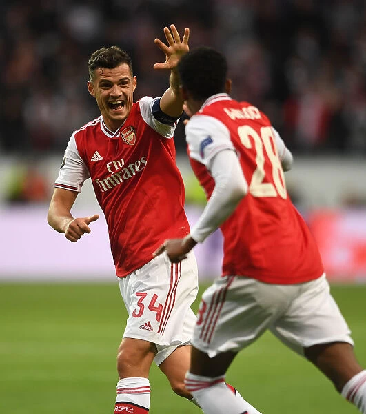 Arsenal's Europa League Winning Moment: Xhaka and Willock's Jubilant Celebration vs Eintracht Frankfurt