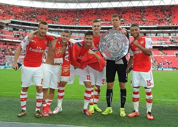 Arsenal's FA Community Shield Winning Squad: Debuchy, Wilshere, Giroud, Chambers, Szczesny, Oxlade-Chamberlain Celebrate Victory