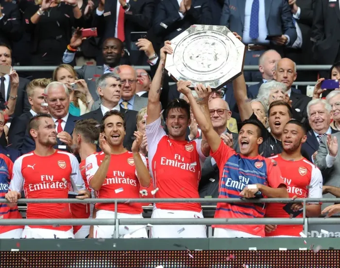 Framed Print : Arsenal's FA Community Shield Winning Team: Debuchy, Flamini, Giroud, Sanchez, Oxlade-Chamberlain Celebrate Victory