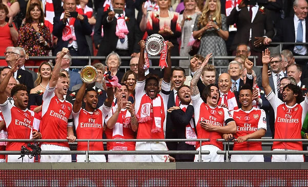 Arsenal's FA Cup Triumph: Danny Welbeck Lifts the Trophy After Arsenal v Chelsea