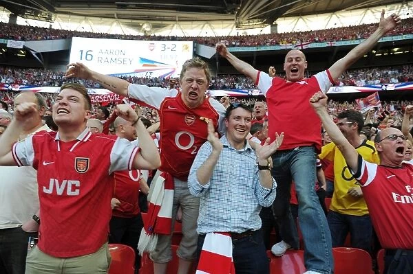 Arsenal's FA Cup Triumph: Fans Celebrate Third Goal vs. Hull City (2014)
