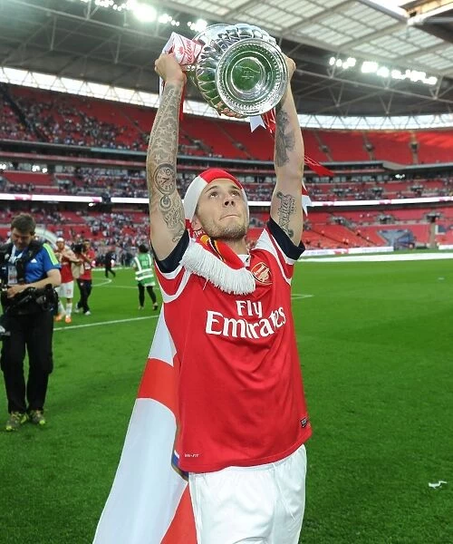 Arsenal's FA Cup Triumph: Jack Wilshere's Celebration at Wembley
