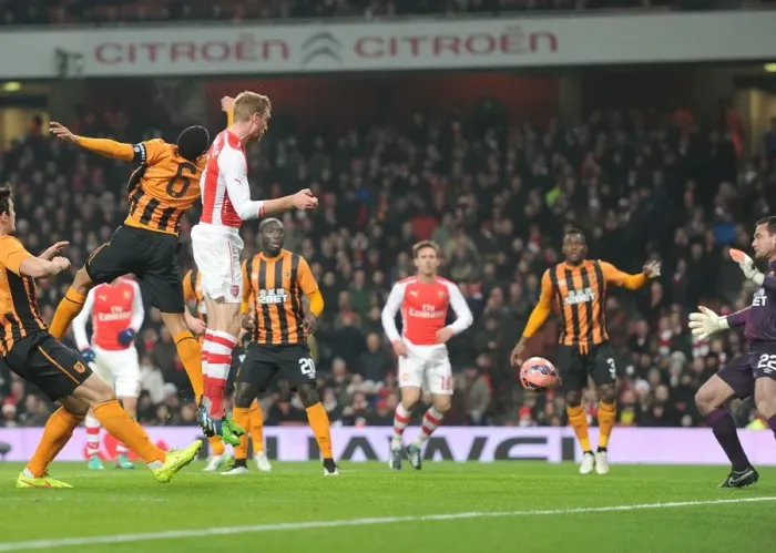 Framed Print : Arsenal's FA Cup Triumph: Per Mertesacker's Header Against Hull City (January 2015) Framed Print : Arsenal's FA Cup Triumph: Per Mertesacker's Header Against Hull City (January 2015)