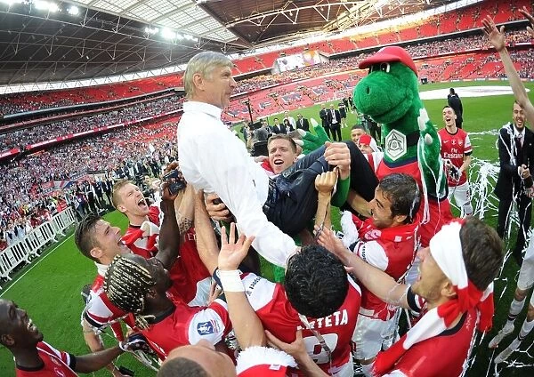 Arsenal's FA Cup Victory: Arsene Wenger and the Jubilant Squad Celebrate at Wembley Stadium