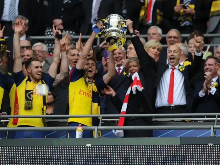 Framed Print : Arsenal's FA Cup Victory: Arsene Wenger and Nacho Monreal Celebrate with the Trophy (2015)