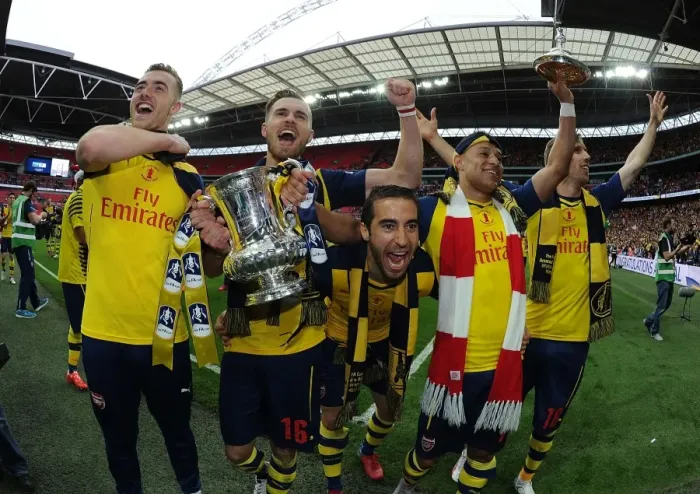 Framed Print : Arsenal's FA Cup Victory: Celebrating with Chambers, Ramsey, Flamini, Oxlade-Chamberlain, and Monreal