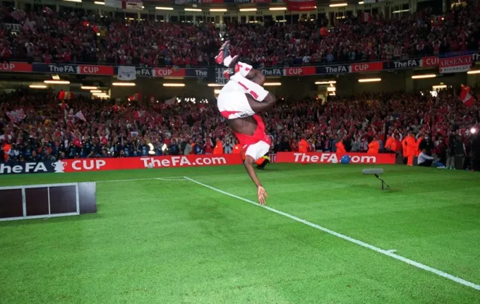 Framed Print : Arsenal's FA Cup Victory: Kolo Toure's Euphoric Backflip at the Millennium Stadium, 2003