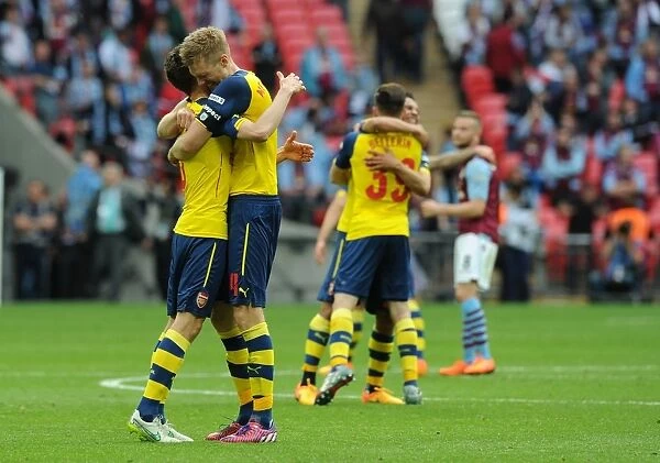 Arsenal's FA Cup Victory: Koscielny and Mertesacker Celebrate Fourth Goal Against Aston Villa