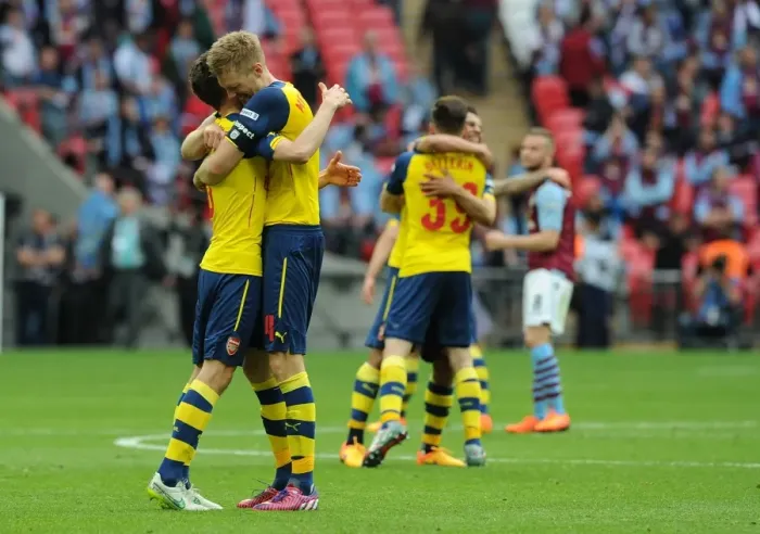 Framed Print : Arsenal's FA Cup Victory: Koscielny and Mertesacker Celebrate Fourth Goal Against Aston Villa