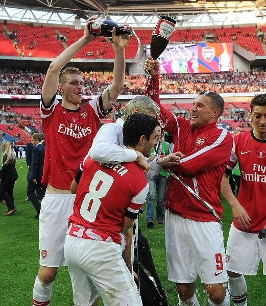 Arsenal's FA Cup Victory: Mertesacker, Arteta, and Podolski Celebrate with Champagne and Wenger