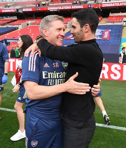 Arsenal's FA Cup Victory: Mikel Arteta and Steve Round Embrace in Empty Wembley