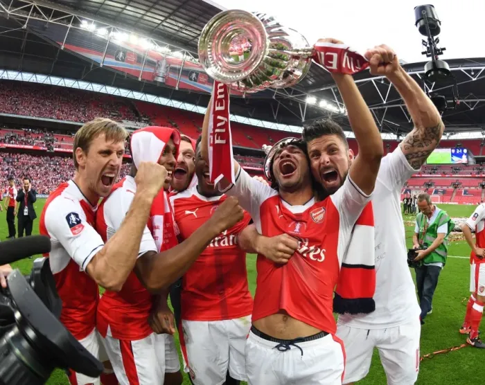 Framed Print : Arsenal's FA Cup Victory: Monreal, Iwobi, Mustafi, Welbeck, Elneny, and Giroud Celebrate Framed Print : Arsenal's FA Cup Victory: Monreal, Iwobi, Mustafi, Welbeck, Elneny, and Giroud Celebrate