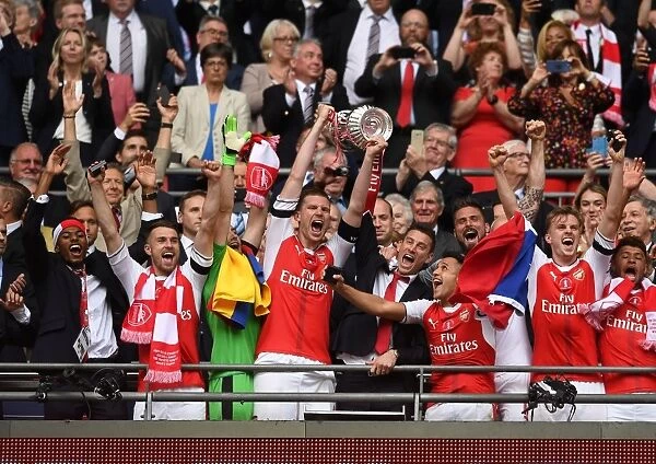 Arsenal's FA Cup Victory: Ramsey, Mertesacker, Koscielny, Sanchez, Holding Lift the Trophy
