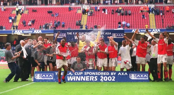 Framed Print : Arsenal's FA Cup Victory: The Squad Celebrates at The AXA FA Cup Final, Millennium Stadium, Cardiff, Wales (April 5, 2002) - Credit: Stuart MacFarlane  /  Arsenal Football Club