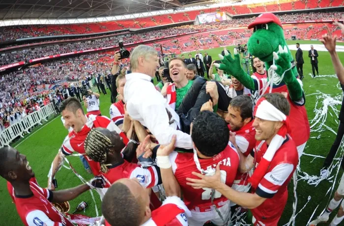 Framed Print : Arsenal's FA Cup Victory: Wenger Lifted in Triumphant Team Celebration