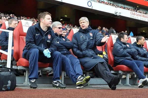 Arsenal's FA Cup Victory: Wenger, Rice, and Lewin Celebrate over Huddersfield Town (2011)