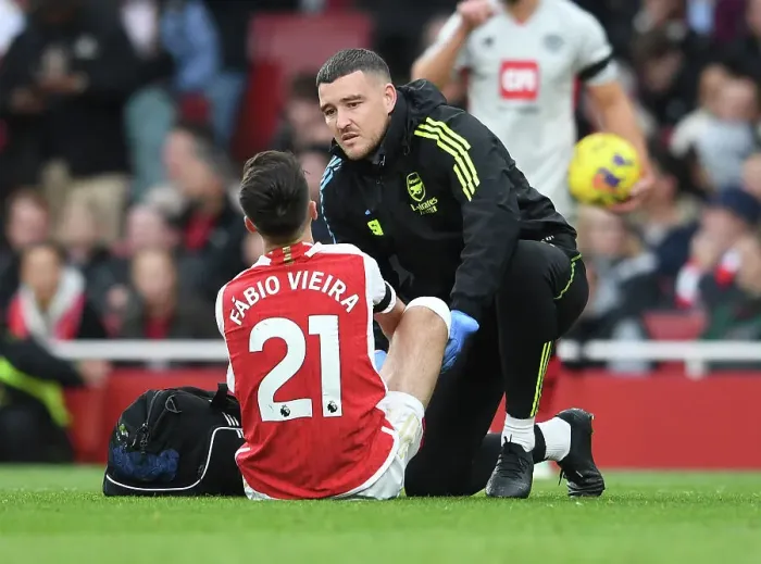 Framed Print : Arsenal's Fabio Vieira Receives Treatment: Arsenal FC vs Sheffield United, 2023-24 Premier League