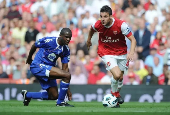 Framed Print : Arsenal's Fabregas and Muamba Clash in Arsenal's 4-1 Victory over Blackburn Rovers
