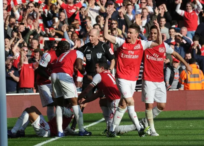 Framed Print : Arsenal's Five-Goal Blitz: Koscielny and Arteta Celebrate Walcott's Goal vs. Tottenham (2011-12) Framed Print : Arsenal's Five-Goal Blitz: Koscielny and Arteta Celebrate Walcott's Goal vs. Tottenham (2011-12)