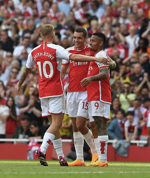 Arsenal's Five-Star Performance: Jakub Kiwior, Gabriel Jesus, and Emile Smith Rowe Celebrate Goals Against Wolverhampton Wanderers (2022-23)