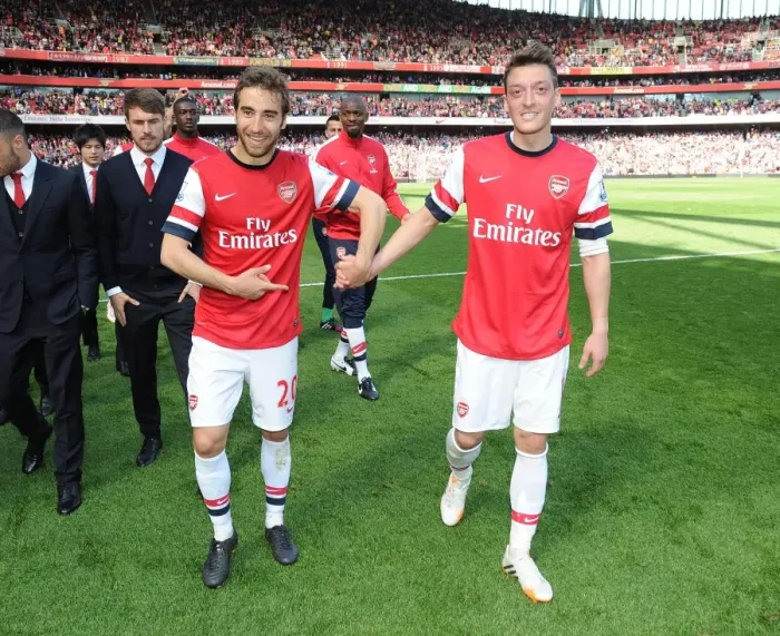 Framed Print : Arsenal's Flamini and Ozil: Savoring Victory over West Bromwich Albion (2013-14)