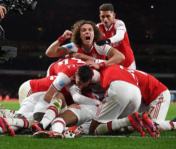 Arsenal's Four-Goal Blitz: David Luiz Celebrates Lacazette's Strike Against Newcastle United (2019-20)