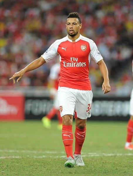 Arsenal's Francis Coquelin in Action Against Everton during the 2015-16 Barclays Asia Trophy in Singapore