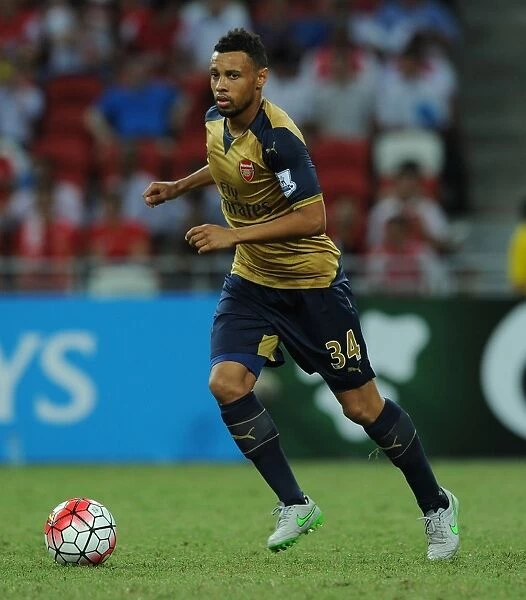 Arsenal's Francis Coquelin in Action against Singapore XI during the Barclays Asia Trophy