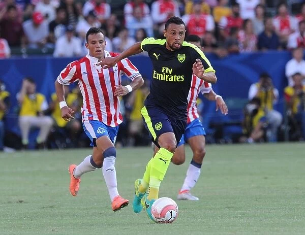 Arsenal's Francis Coquelin Faces Off Against Chivas Daniel Gonzalez in Pre-Season Clash